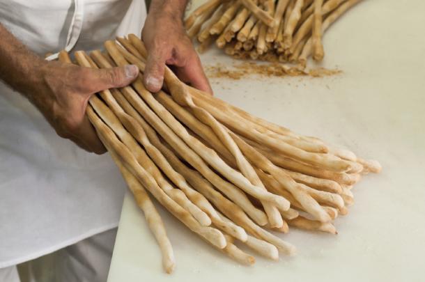 "Grissini", the traditional Turin's bredsticks now common all over Italy, are a good example of how piedmontese cousine mixes the simple ingenuity of its farming communities with the cosmopolitan sofistication its regional capital. © iStockphoto/Thinkstock Piedmont traditional grissini breadsticks