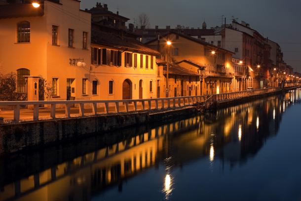 The Navigli district, a former working class neighborhood criss-crossed by canals, is now one of Milan's most popular nightlife destinations, packed with galleries, antique shops, restaurants and trendy bars. © iStockphoto/Thinkstock The Navigli district at dusk in Milan