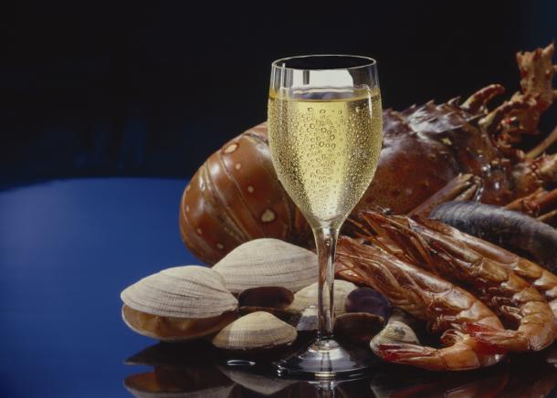 Italian white wines were often perfected over centuries to compliment and enhance specific local food recipes. To test and discover these unusual combinations is a wonderful adventure in taste. © iStockphoto/Thinkstock Pairing Italian white wine and food