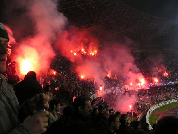 Soccer fans lighting flares in Naples