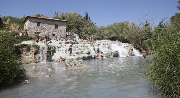 Some Italian hot springs, like Terme di Saturnia in Tuscany, have preserved an all-natural setting. © Hemera/Thinkstock Terme di Saturnia rustic settings
