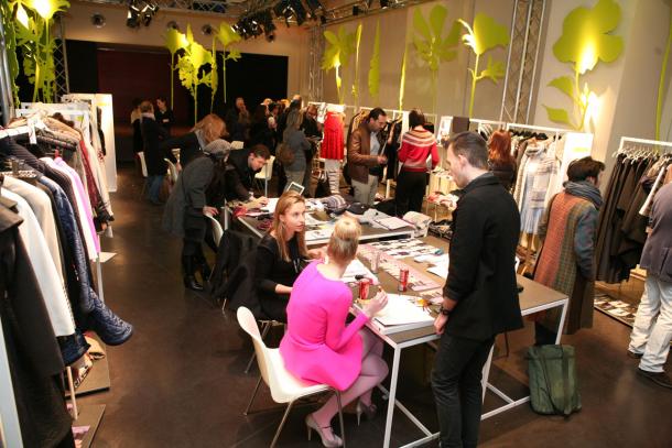 Italian ready-to-wear exhibitors at a trade fair in Milan